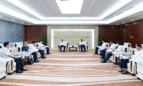 丁焰章与中国三峡集团董事长、党组书记刘伟平会谈