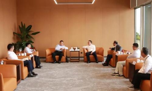 李远飞与中电工程华东院党委书记、董事长周毅座谈交流