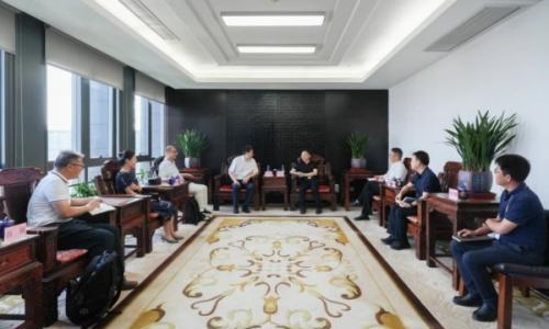 万明忠与长江设计集团党委书记、董事长胡向阳就加快甘肃酒泉300MW压缩空气储能电站示范工程建设等议题进行交流